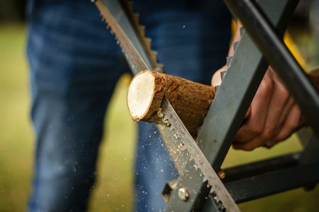 picture of a man working with a portable sawhorse